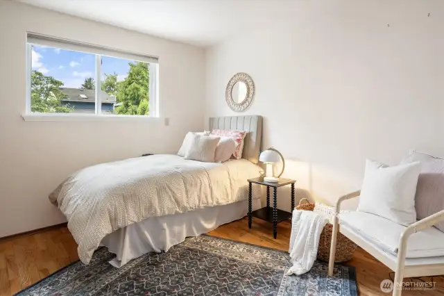 A second bedroom compounds the comforts of the first, offering no shortage of rest and repose.