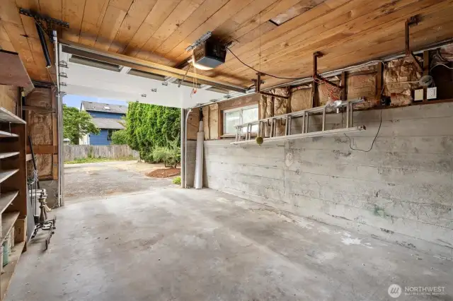 The large one car garage has an interior door to the house, automatic garage door opener and is located off the dead end alley for easy access.