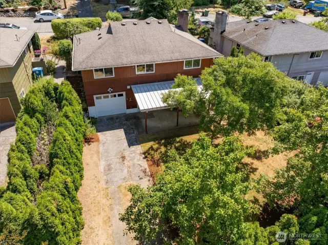 Privacy and the welcome of abundant green await down the dead-end alley.