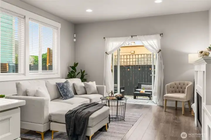 Living room with high ceilings and large oversized windows