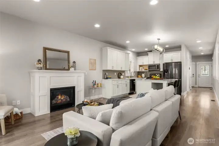 Living room has gas fireplace