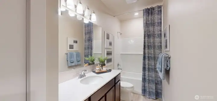 Photo is of a model home in another KB Home location; options and colors may vary based on your selections. Depictions of home, layout, location or other features/options, colors and color scheme, materials, fixtures, etc. are for showing purposes only and may not be included in the purchase price and availability may vary.