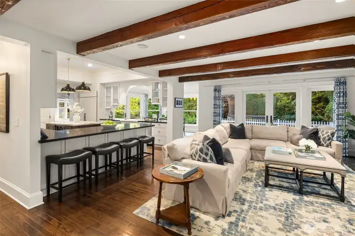 A beamed great room that opens to a covered patio for year-round entertaining.