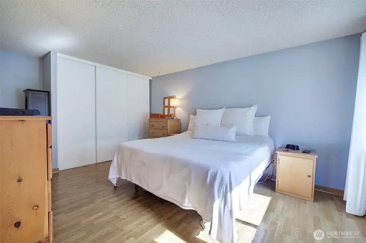 Upper level primary suite is generous in size.