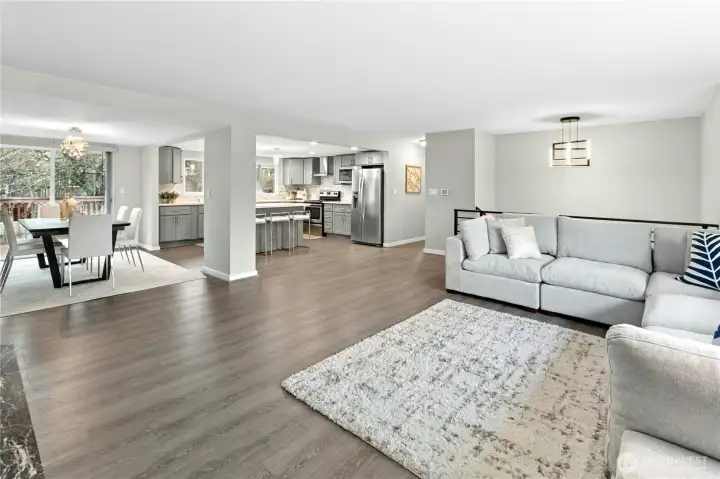 Spacious living room, open concept floorplan and abundant natural light