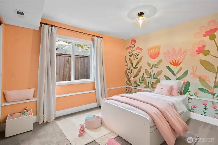 Virtually staged photo. Fourth bedroom, located downstairs.