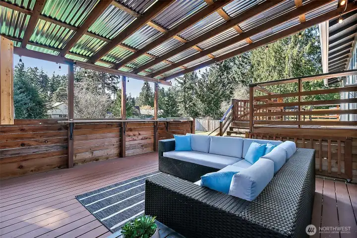 The covered deck allows outdoor enjoyment all year long!