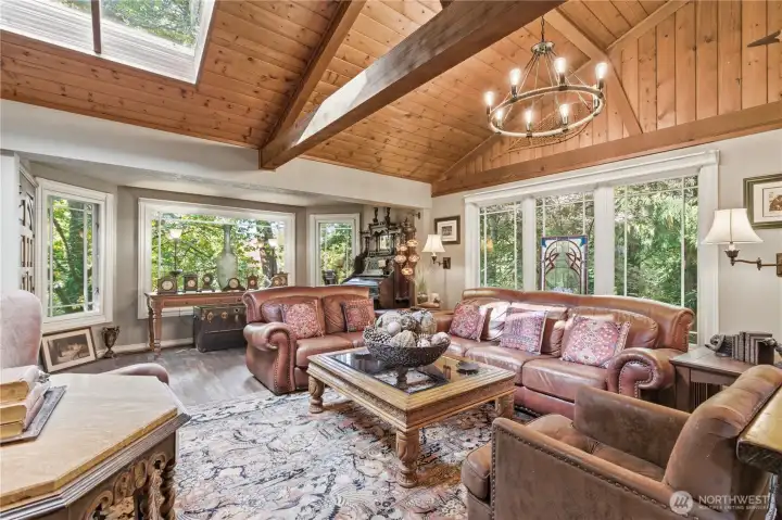 Rustic elegance shines through with handcrafted beams and wood-paneled ceilings.