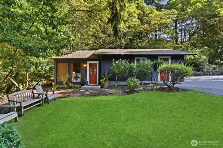 A rare and versatile retreat—this private sanctuary room attached to the detached garage offers the perfect escape for relaxation, creativity, or quiet reflection.