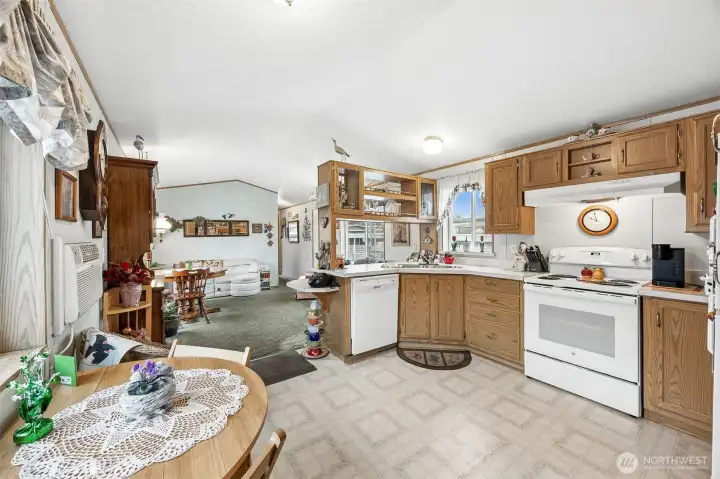 Open concept kitchen is functional & bright.