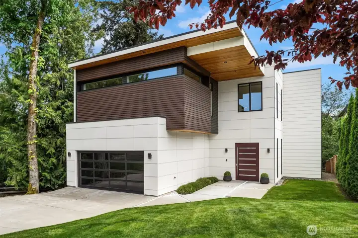 A modern marvel perfectly sited on Forbes Lake in the heart of Rose Hill Kirkland