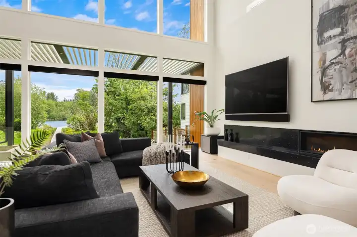 A linear gas fireplace offers a cozy respite