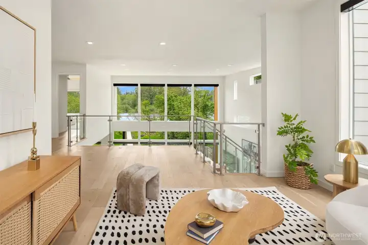 Views from the open bonus room. The tall ceilings continue on the upper level, providing lots of natural light
