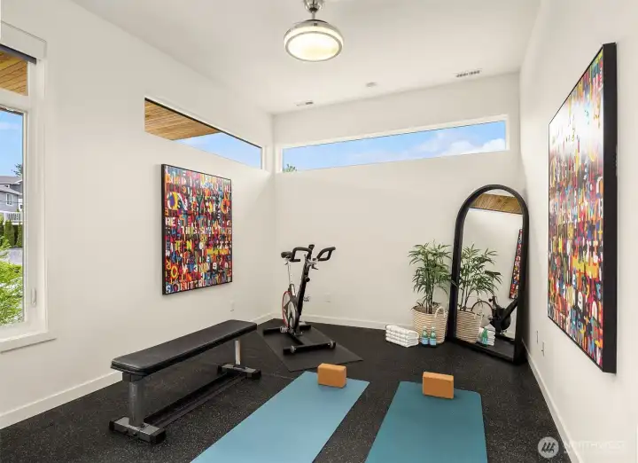 The sellers converted one of the upper bedrooms into a home gym. Easy to change the carpet and turn back into another upper bedroom