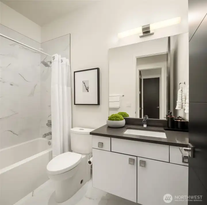 Another full bathroom next to upper bedroom