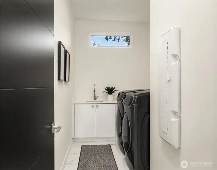 Upper laundry rom with folding counter