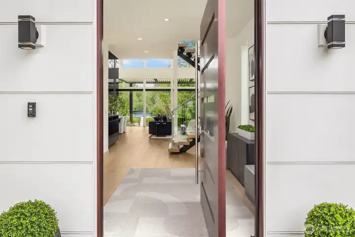 A wide entry door welcomes you into the home