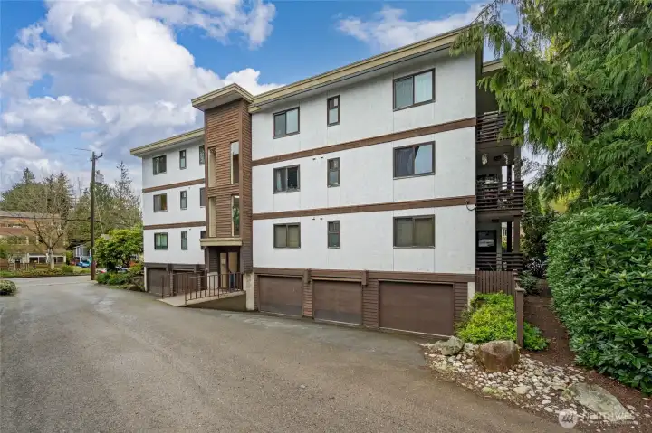 Unit 205 garage is the 3rd one on the left.