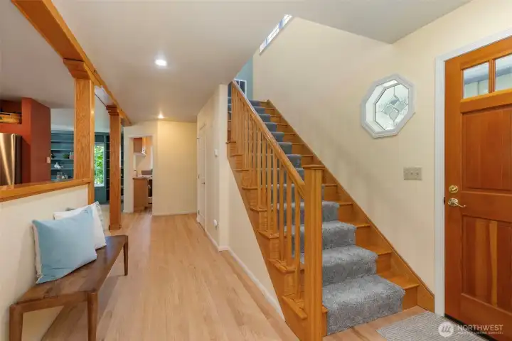 Fresh floors, new carpet and open rooms greet you.