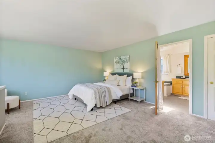 Upstairs primary loft with walk-in closet and tons of natural light.