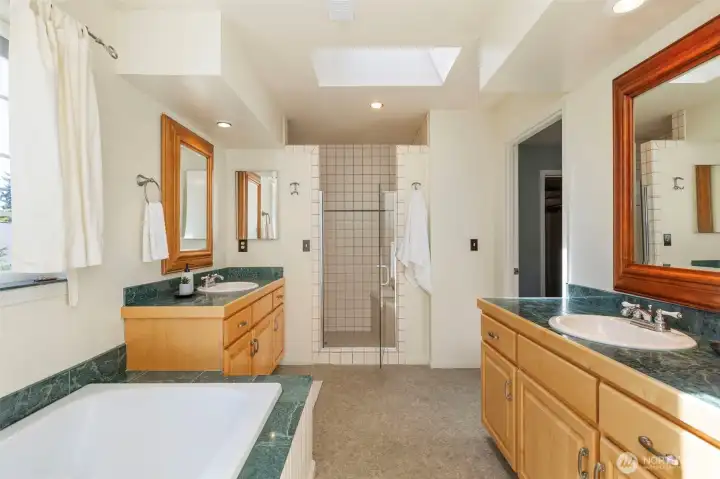 Full tub and walk-in separate shower.