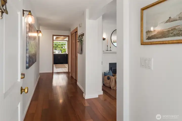 Inside you are greeted with a formal entry and gleaming hardwood floors with no carpet anywhere.