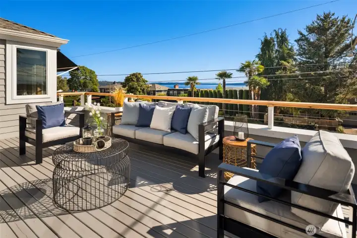 Bask on this south facing composite deck with glorious views of the Puget Sound, Mt Rainier and the Olympics.