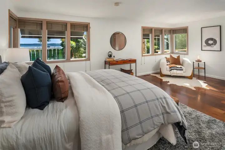 This second bedroom can easily handle 2 bedroom sets with room for more.