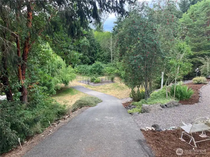 Driveway extends down to property and out the otherside at easement Driveway extends down to property and out the otherside at easement