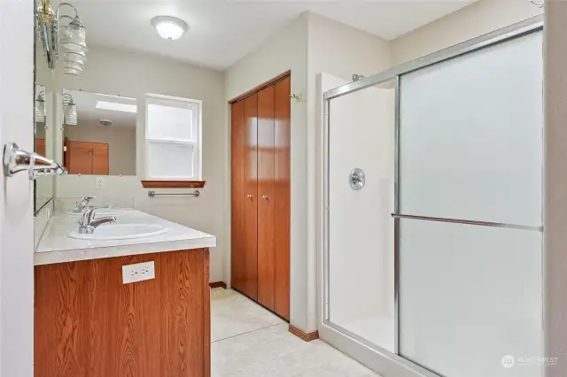 Primary bath with shower and linen closet