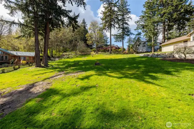 The lg. lot offers plenty of room for your home and shop/RV.