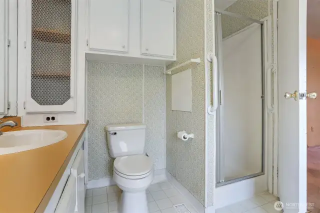 Master bedroom suite with a walk in closet and a 5 piece bathroom.