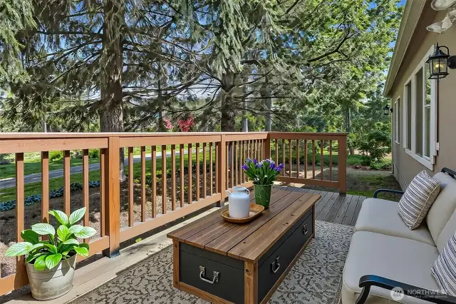 Deck overlooks the community greenbelt - virtually staged photo