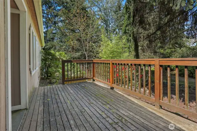 Deck overlooks the community greenbelt