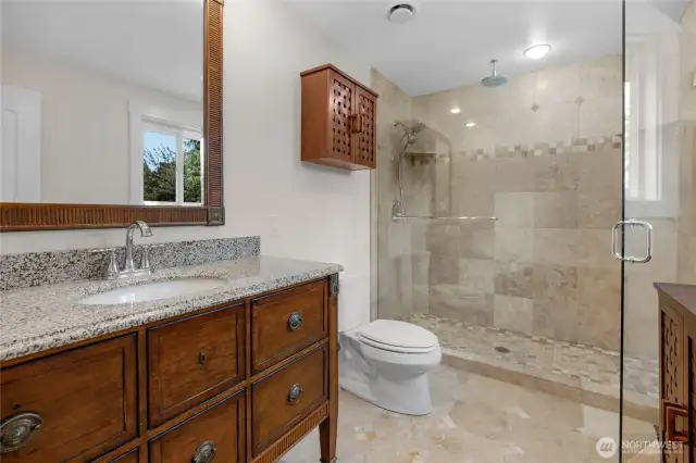 Upper primary bath with tile shower