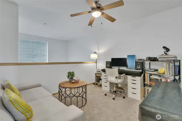 Large loft at the top of the staircase.