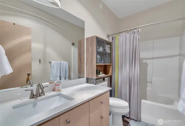 Full bathroom in the primary suite.
