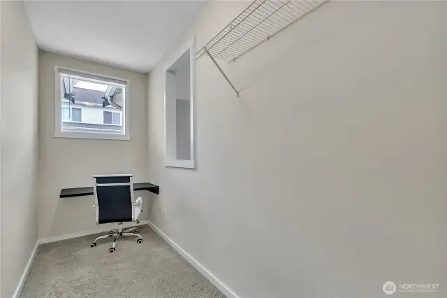 Office space on the second floor with built-in desk.