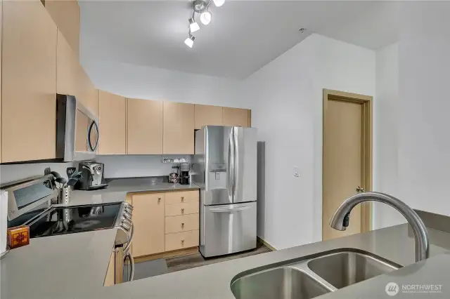 Quartz countertops throughout the kitchen, giving a sleek and clean look.