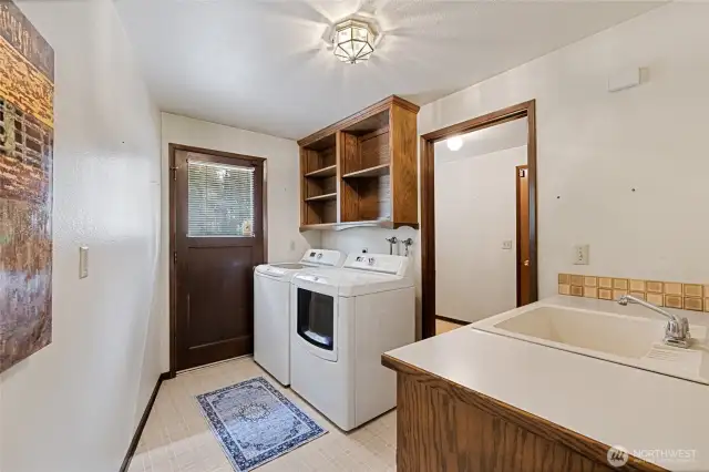 Laundry room/mud room with door to exterior