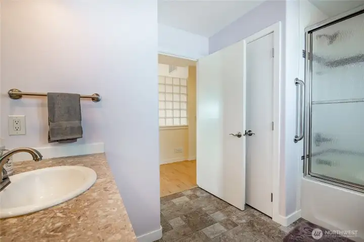 The full bath in between guest rooms on the main floor. Handicap bars in place.