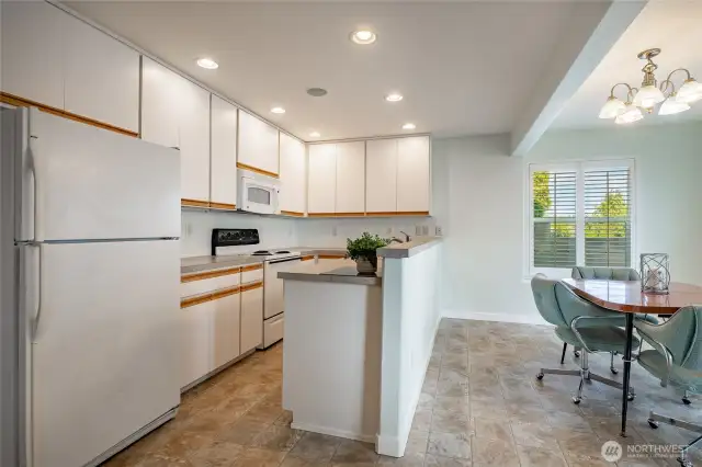 See kitchen and dining areas.