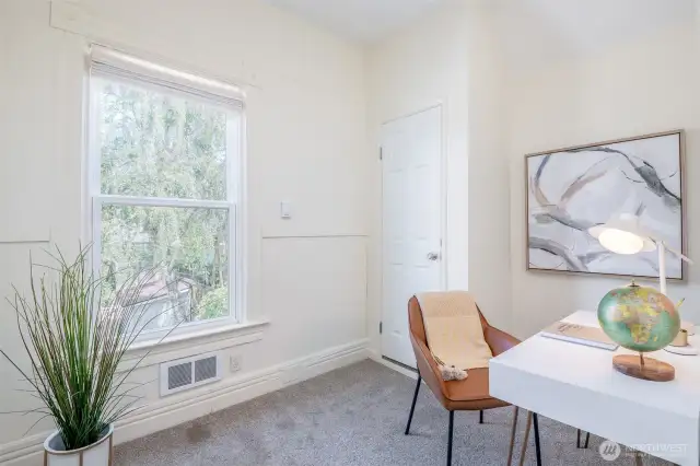 The third bedroom is smaller in size, perfect for a kids room or office.