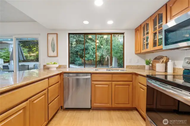 This open-concept kitchen offers effortless flow, allowing you to prep and cook while staying connected with guests—indoors or out.