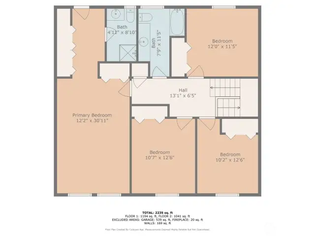 The upper floor offers a well-designed layout featuring a spacious Primary Suite with ensuite bath and private access, along with three additional bedrooms and a full guest bathroom—perfect for flexible living and everyday comfort.