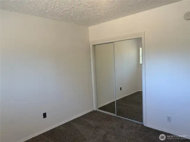 Large mirrored closet space.