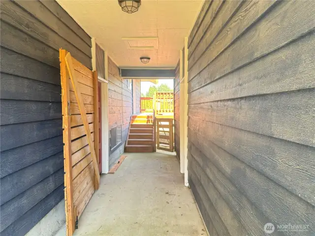 Opens to the backyard and large side deck. Also access to garage and basement.