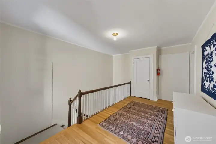 Unit B upstairs landing. Wall to left was originally a door to Unit A -- could be reopened.