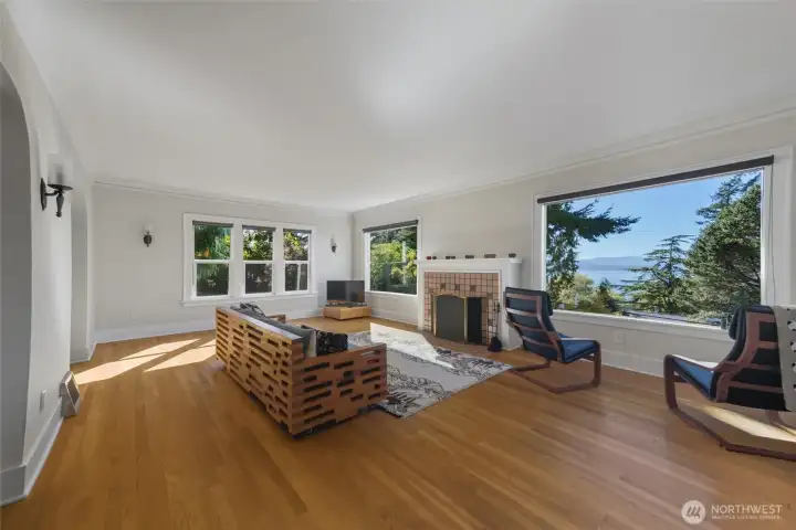 Unit A Living room with cozy fireplace.