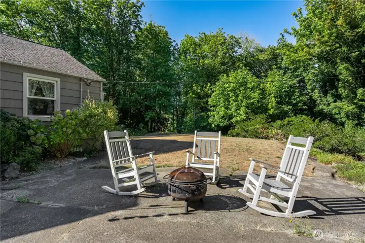 Enjoy a paved patio and fire-pit area for relaxed outdoor entertaining